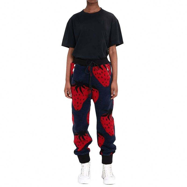Pantaloni casual da uomo personalizzati produttore OEM Pantaloni sportivi in ​​pile con stampa fragole neri Polsini a coste con coulisse in vita elastica
