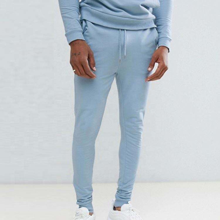 Nagykereskedelmi izzads&aacute;gruh&aacute;k egyedi log&oacute;s izmos kapucnis Skinny kocog&oacute;k