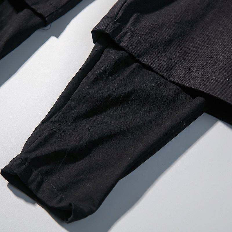 Il produttore OEM personalizza pantaloni sportivi multifunzionali da uomo in colore puro con pantaloni cargo con coulisse Pantaloni da uomo streetwear