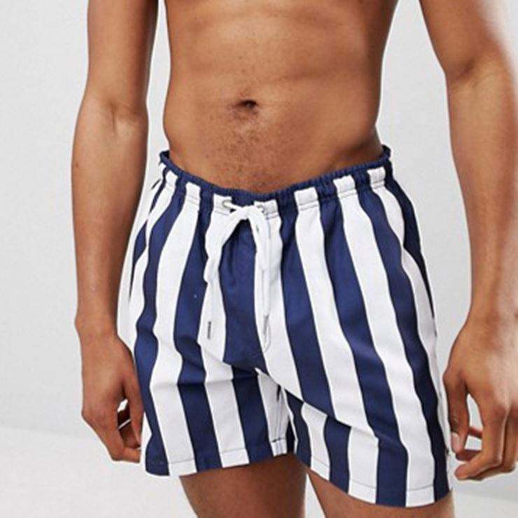 Szorty do pływania w paski marki Your Owm w kolorze granatowym