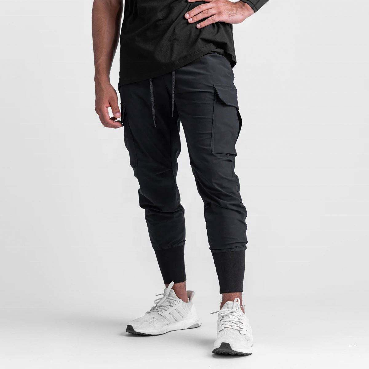 OEM-Hersteller ma&szlig;geschneiderte Slim-Fitness-Cargo-Jogginghosen f&uuml;r Herren, Fitnessstudio, Sport-Trainingshose mit gro&szlig;en Cargo-Taschen