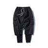 Il produttore OEM personalizza pantaloni sportivi multifunzionali da uomo in colore puro con pantaloni cargo con coulisse Pantaloni da uomo streetwear