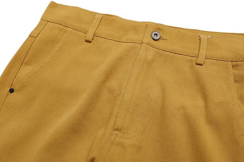 Pantaloni casual da uomo con logo personalizzato High Street del produttore OEM Pantaloni larghi con rivetti in tinta unita