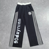 Pantalones deportivos holgados y pesados ​​acampanados con pierna ancha y cintura doble para hombre, pantalones bordados con estampado DTG